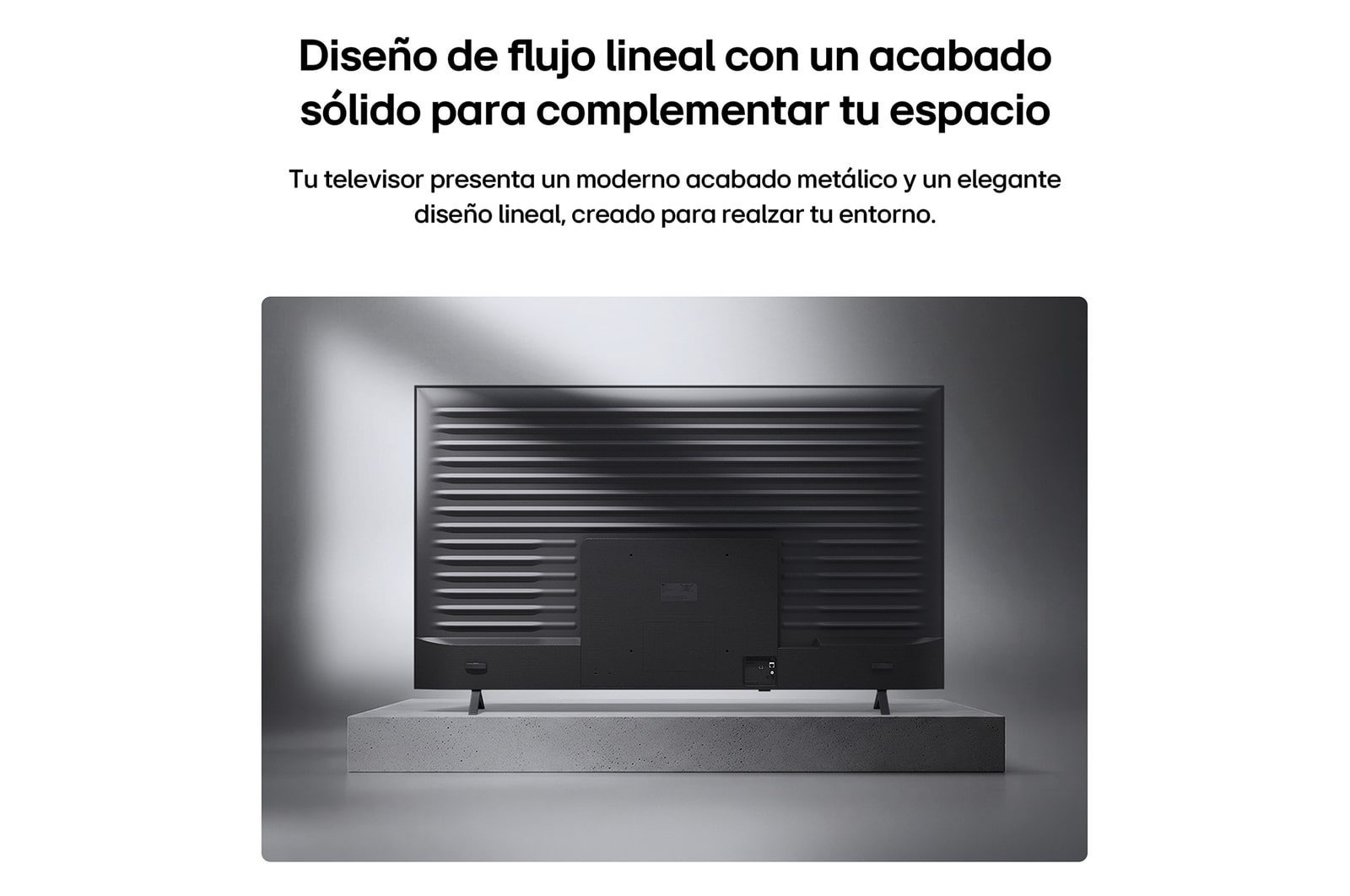 LG QNED AI QNED74 Mini LED is shown from the back, revealing a metallic rear panel with evenly spaced horizontal ridges that create a clean, structured look and emphasize the Linear Flow Design across the entire surface.
